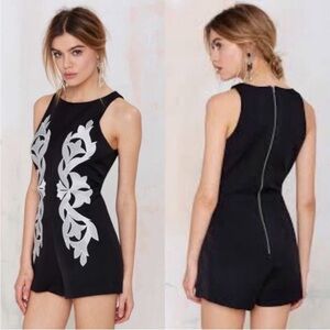 KEEPSAKE The Lebel Black/Silver Embroidery Romper.